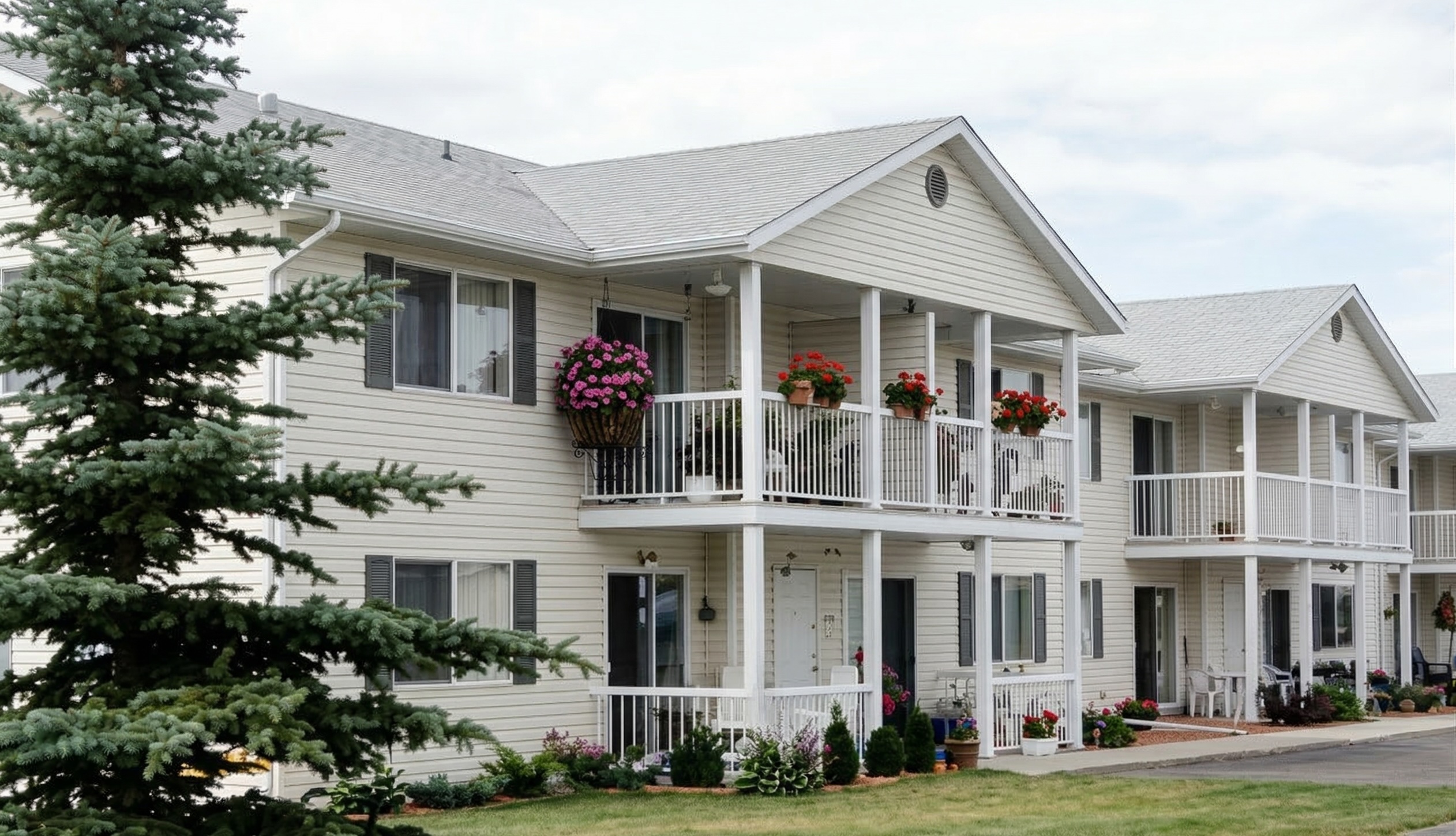 Residential community with green landscaping and mature trees at Northridge Estates, Wetaskiwin.